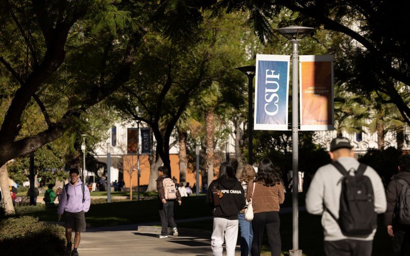 CSUF students walking on campus on the first day of Spring semester classes.