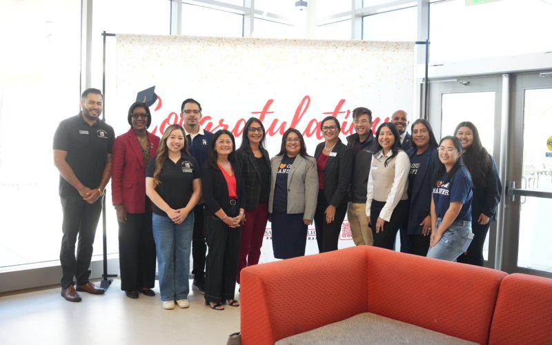 A group photo of Cal State Fullerton and Santa Ana College leaders