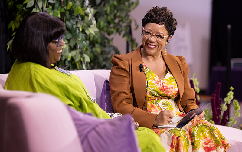 Melissa Majors interviews Martha Blanding on stage in the Titan Student Union.