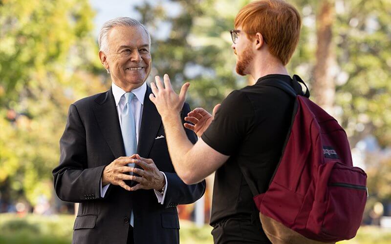 Alum Raúl Tapia with student Colson Houck Teal