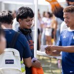 Two students speak at Discoverfest.