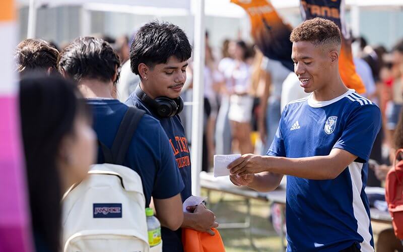 Two students speak at Discoverfest.