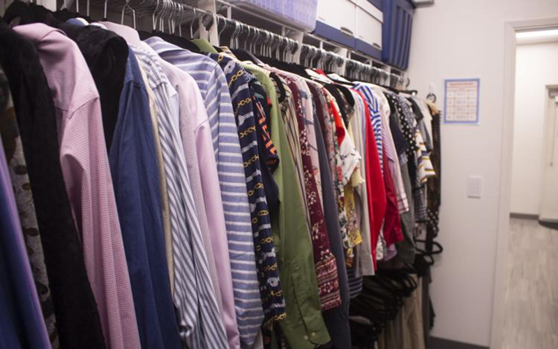 A closet full of different types of business attire