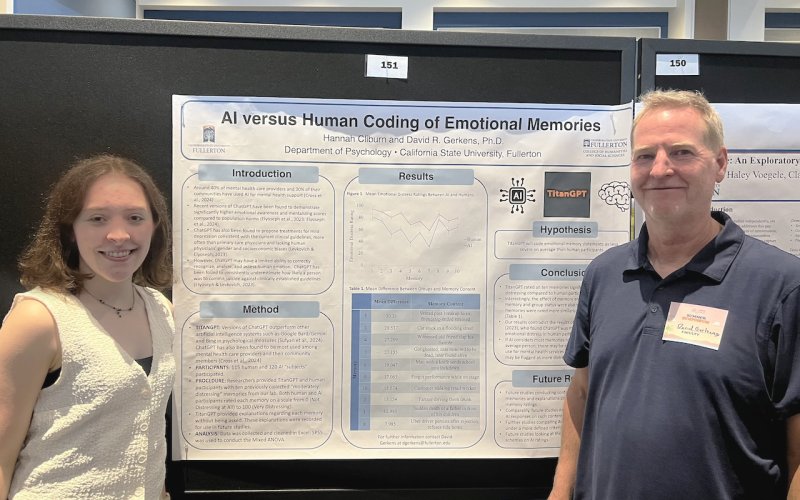 Hannah Cliburn stands in front of a research poster with faculty adviser David Gerkens