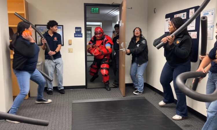 People participate in a hands-on exercise during Active Shooter Response Training