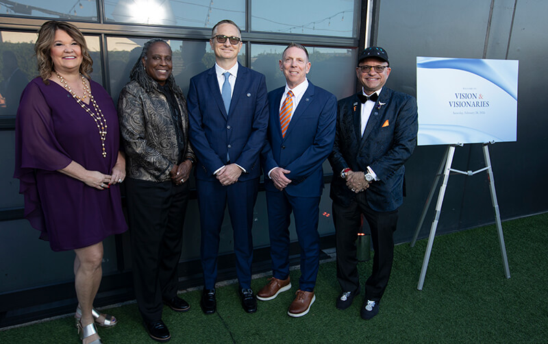 Group photo of Vision & Visionaries award honorees Kristin Crellin, Robin Holmes-Sullivan, Greg Wright, Michael T. Losquadro and Peter Mitchell