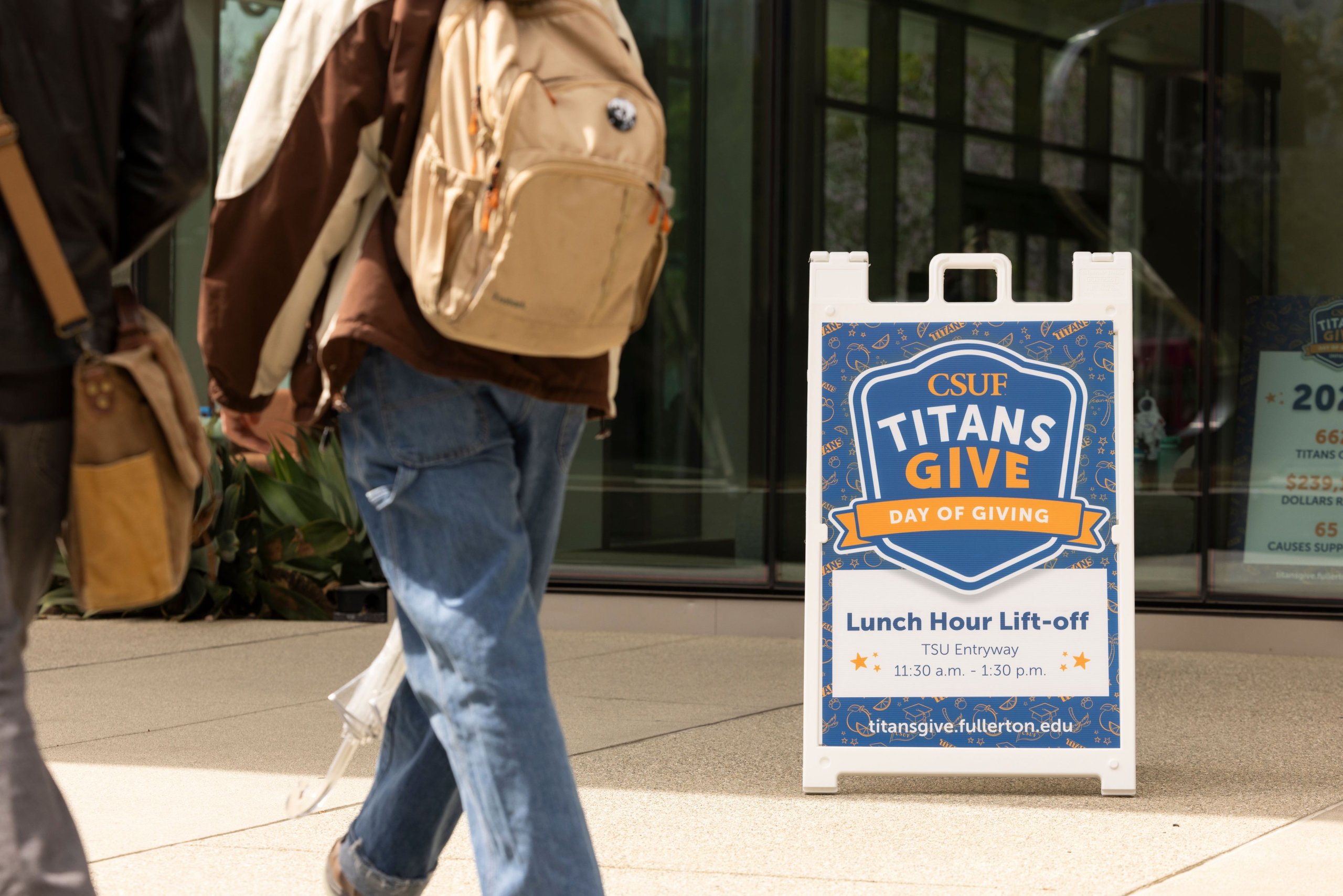 Titans Give Lunch Hour Lift-Off event signage on campus