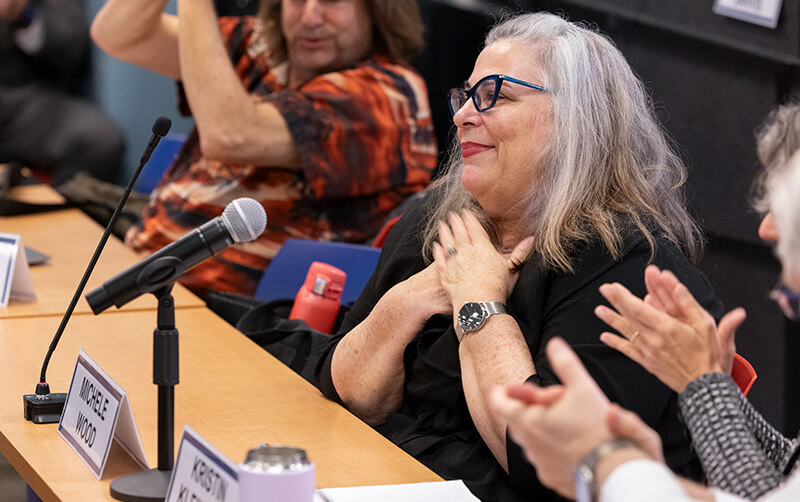 Michele Wood smiles after receiving the 2026 John W. “Jack” Bedell Faculty Leadership in Collegial Governance Award. 