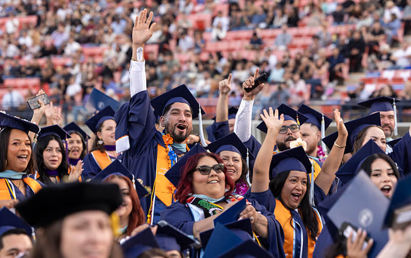 Cal State Fullerton graduates celebrate at Titan Stadium