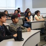 High school students attend a lecture taught by a CSUF faculty member.