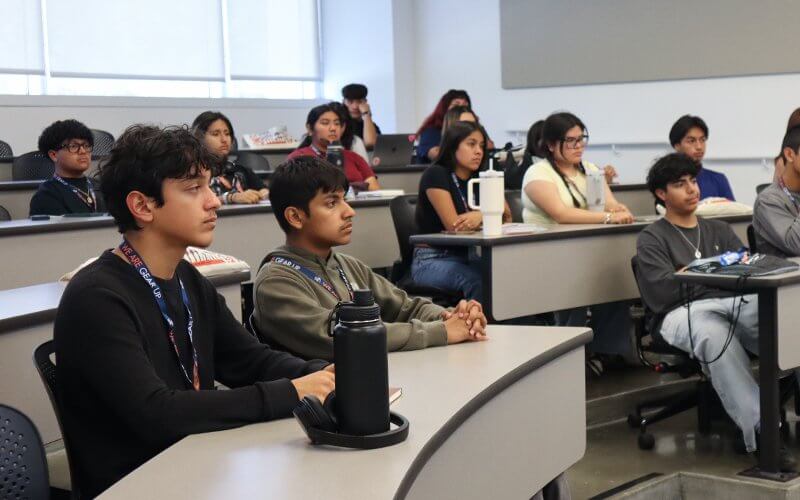 High school students attend a lecture taught by a CSUF faculty member.