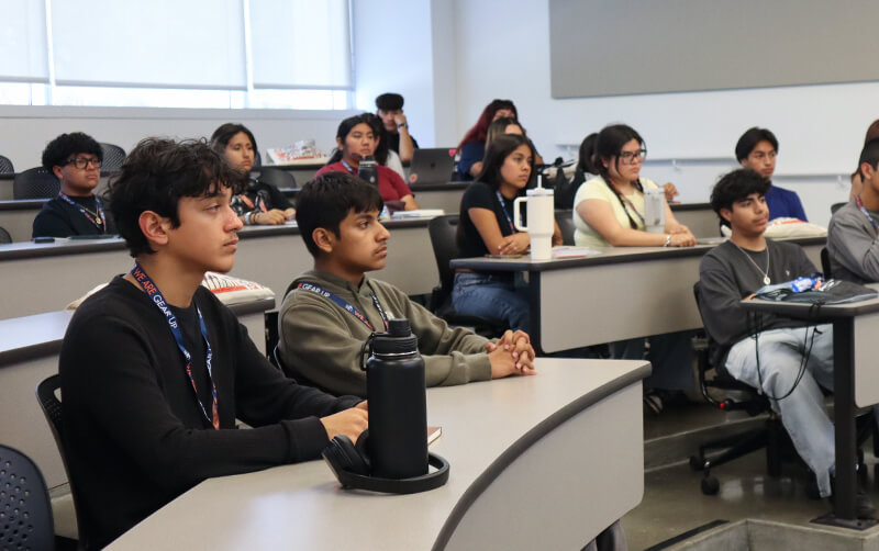 High school students attend a lecture taught by a CSUF faculty member.