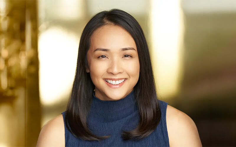 Portrait of Tran My Le, assistant vice president for strategic communications and brand management and chief communications officer