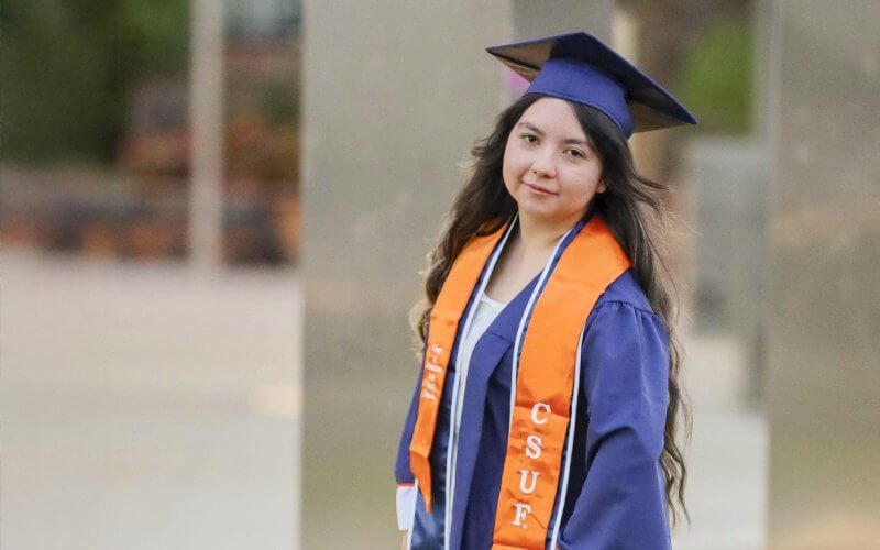 Portrait of Miranda Garcia in graduation regalia