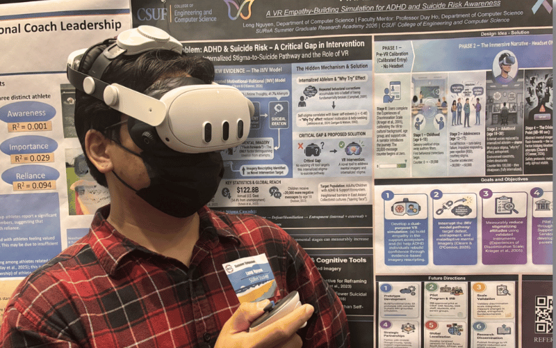 CSUF student Long Nguyen presents research while wearing a virtual reality headset.