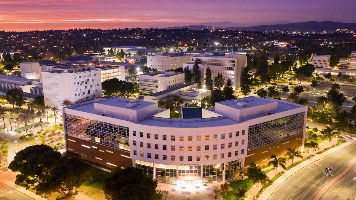 Aerial view of the College of Business and Economics building during sunset