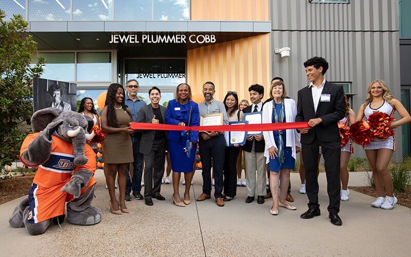 University and student leaders cut the ribbon at the Aug. 28 opening ceremony for Jewel Plummer Cobb Hall.