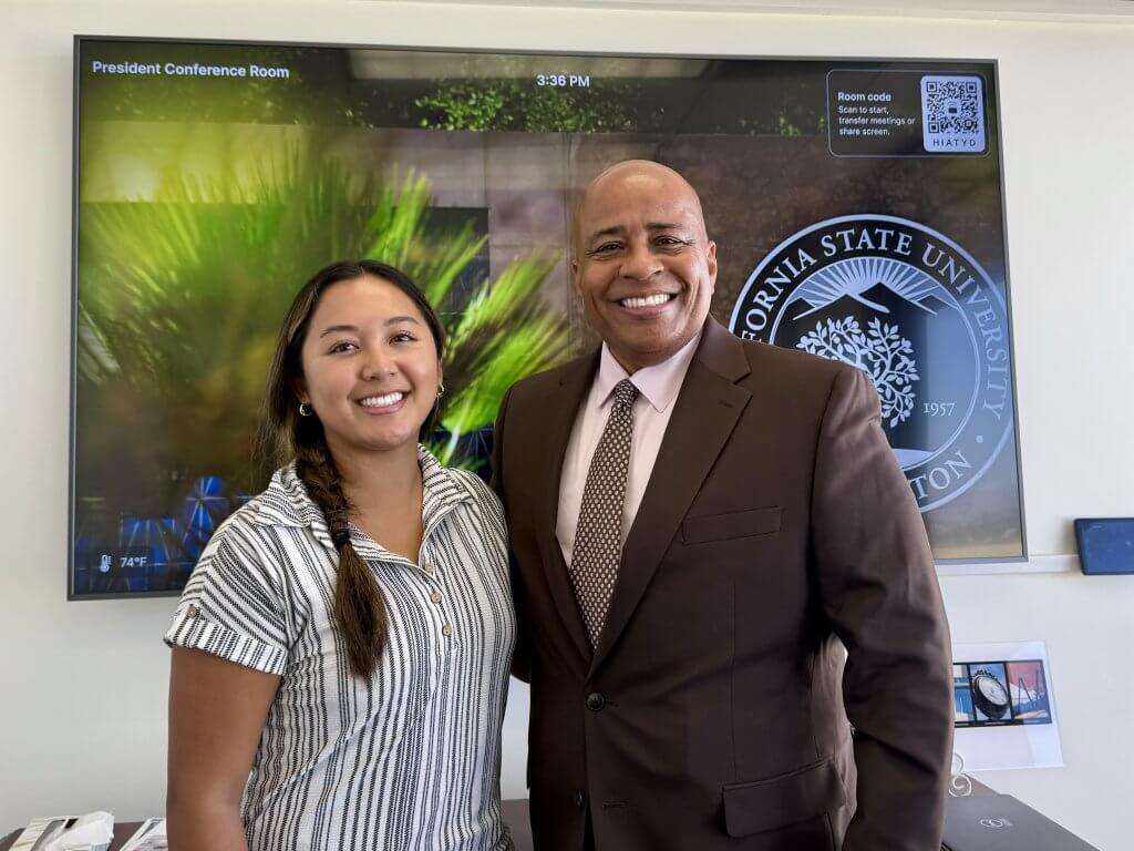 Counseling graduate student Alyssa Khuon and CSUF President Ronald Rochon