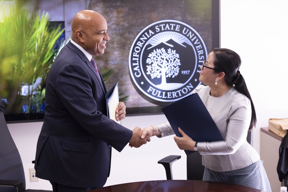President Rochon and Dr. Tep Kolap, rector of Phnom Penh International University (PPIU) signed a Memorandum of Understanding to open doors for students, faculty