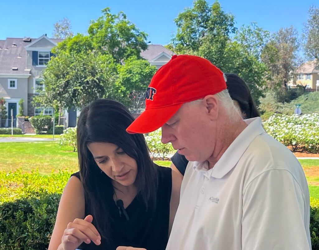 Jennifer Piazza and Daniel Curtis in Ladera Ranch collecting samples.