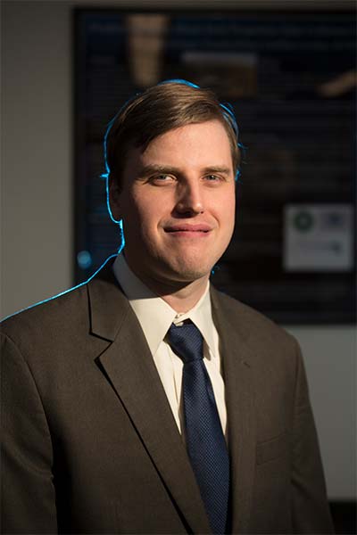 Geoffrey Lovelace with reporters