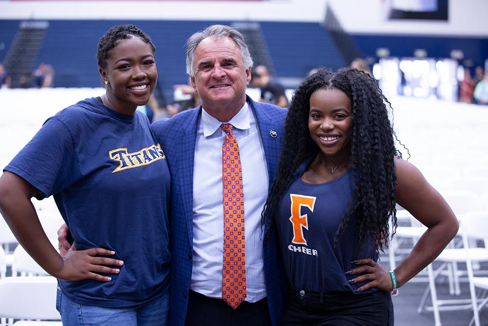 Imani Garner, President Virjee and Asia Scott